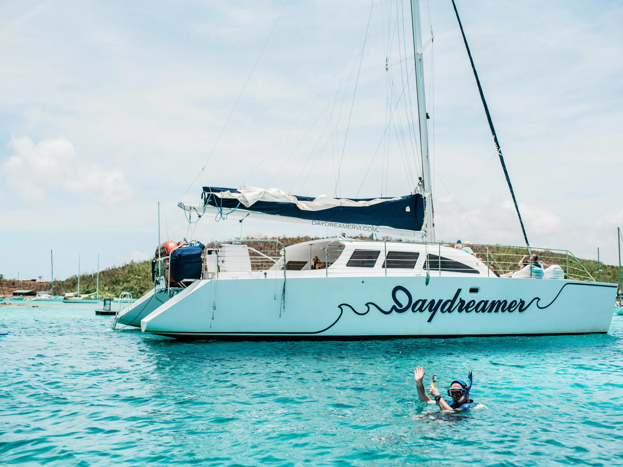 a small boat in a large body of water