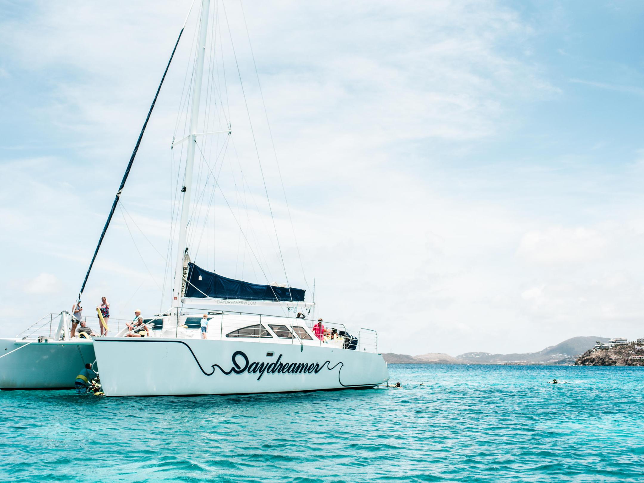 a small boat in a large body of water