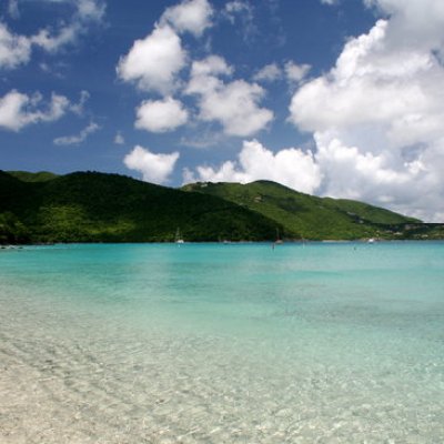 a beach next to a body of water