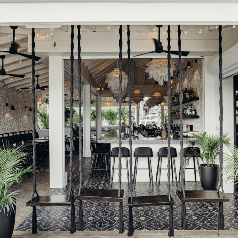 a dining room table in front of a building