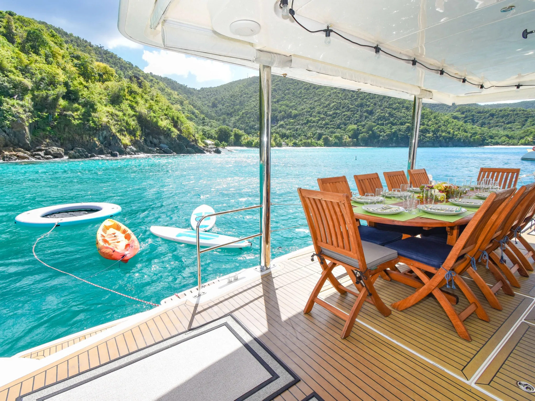 a chair sitting in front of a body of water