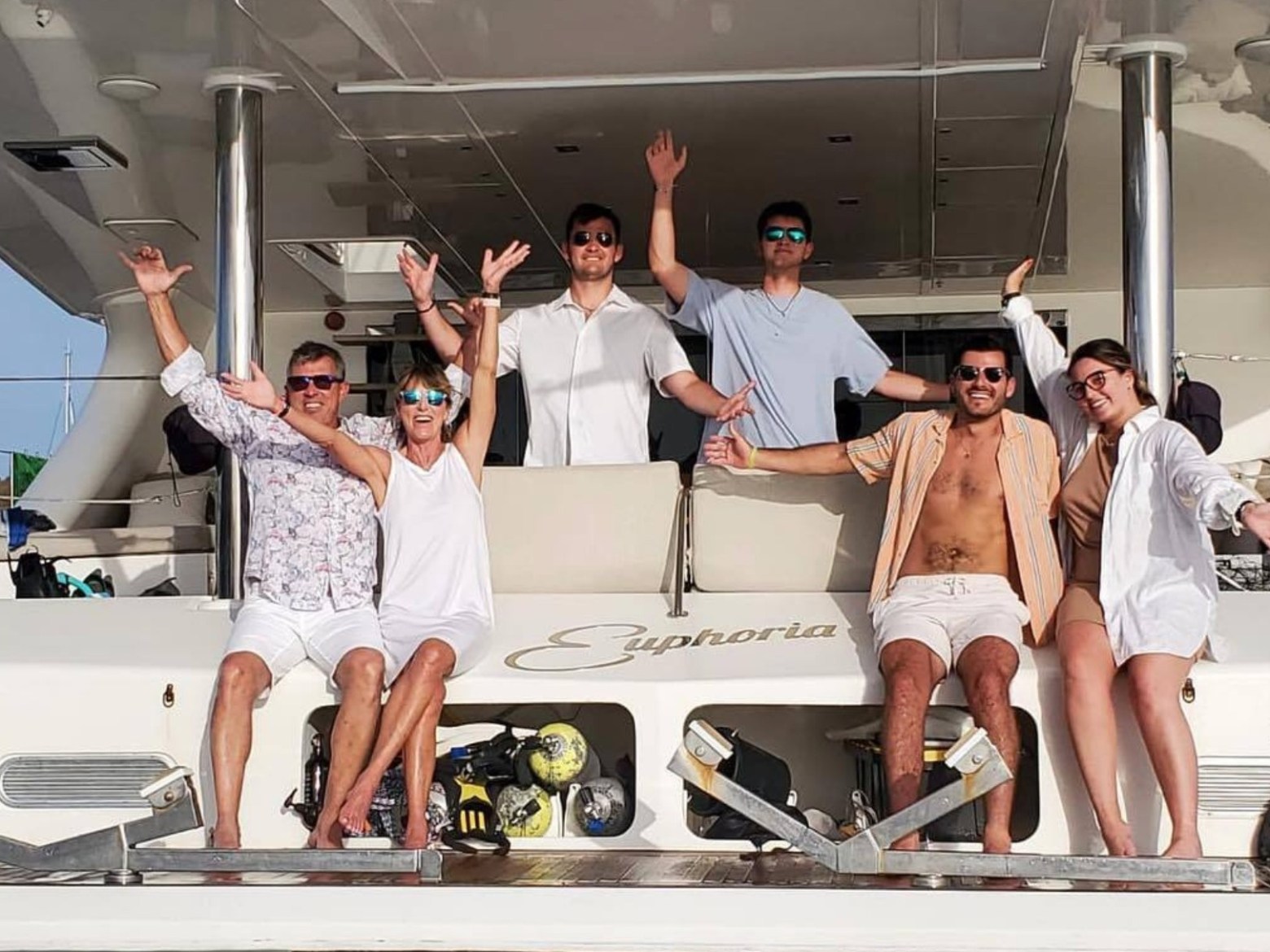 a group of people in a kitchen