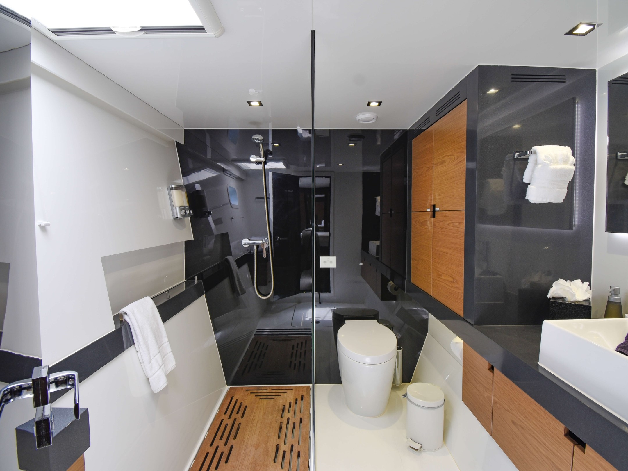 a room with a sink and a mirror