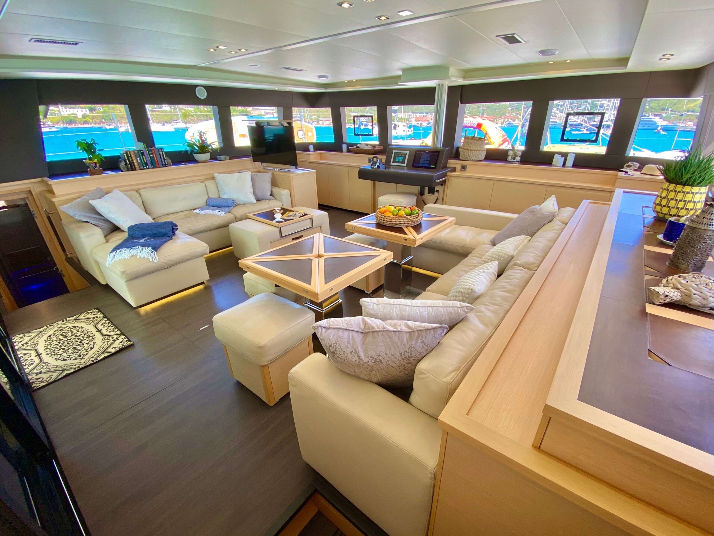 a living room filled with furniture and a flat screen tv