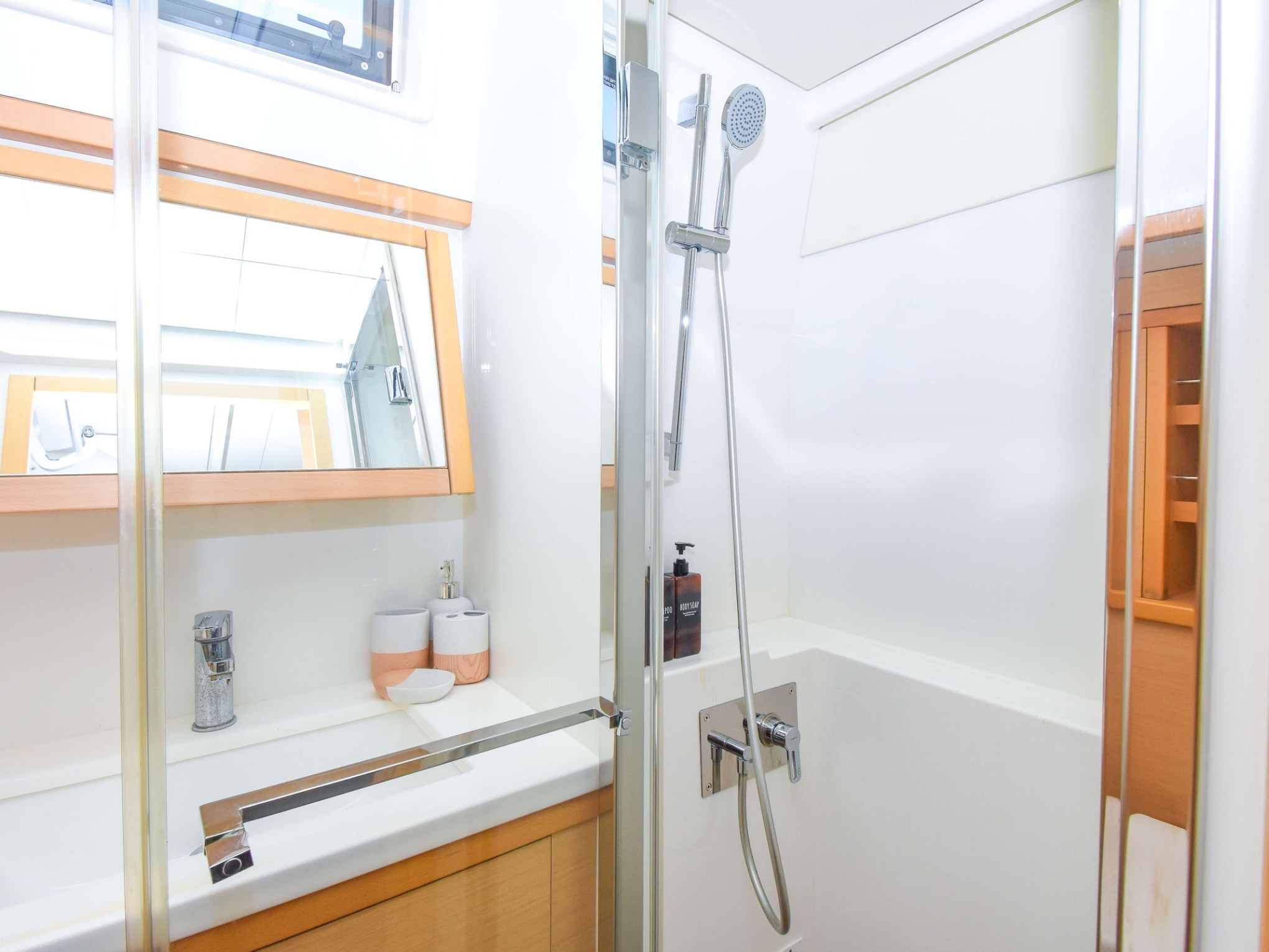 a room with a sink and a mirror