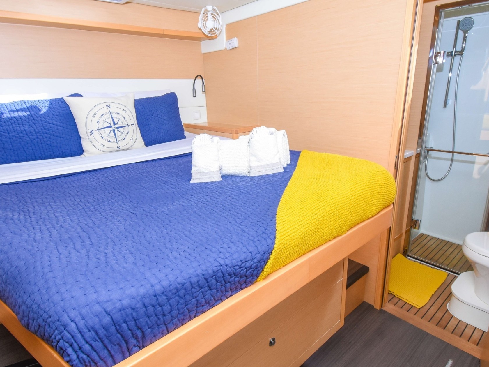 a bedroom with a blue chair