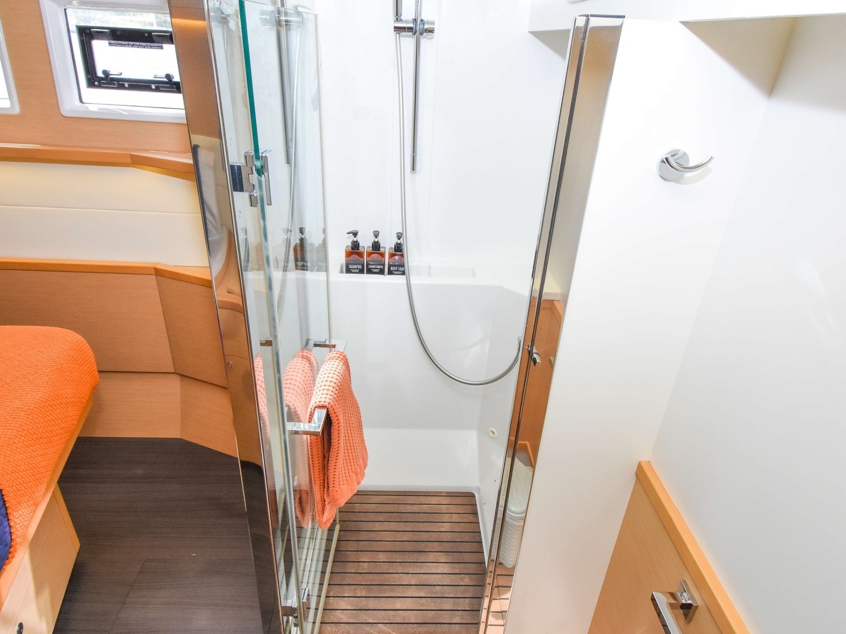 a person sitting at a table in front of a mirror