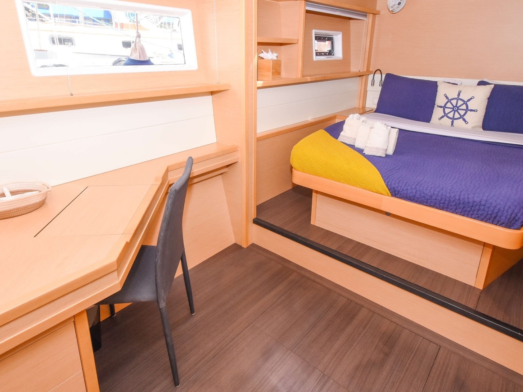 a bedroom with a wooden floor