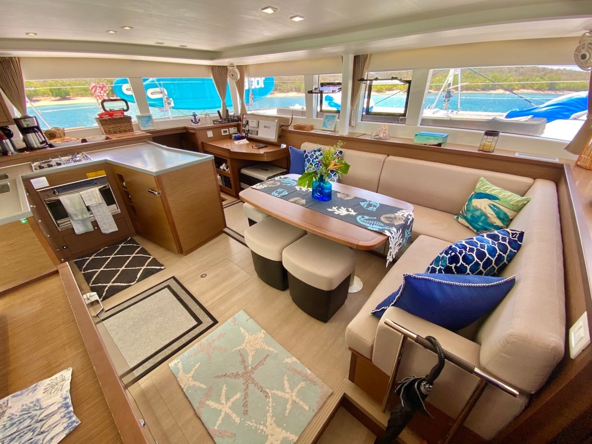 a table topped with a blue chair