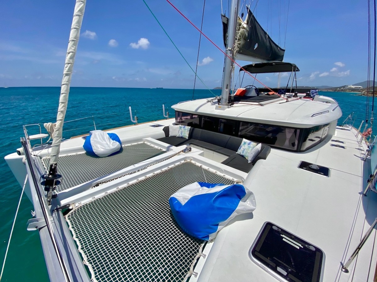 a boat is docked next to a body of water