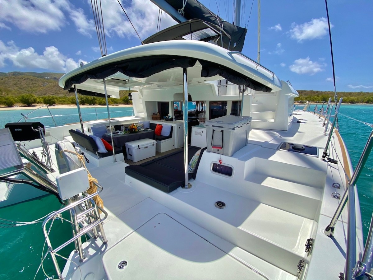 a boat is docked next to a body of water