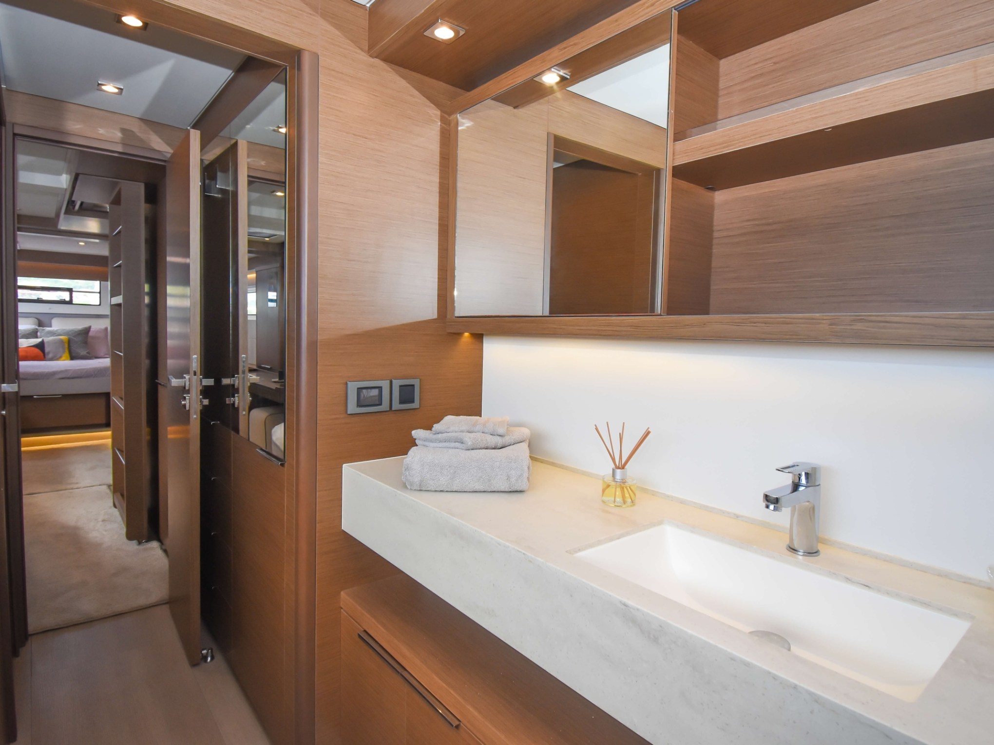 a room with a sink and a mirror