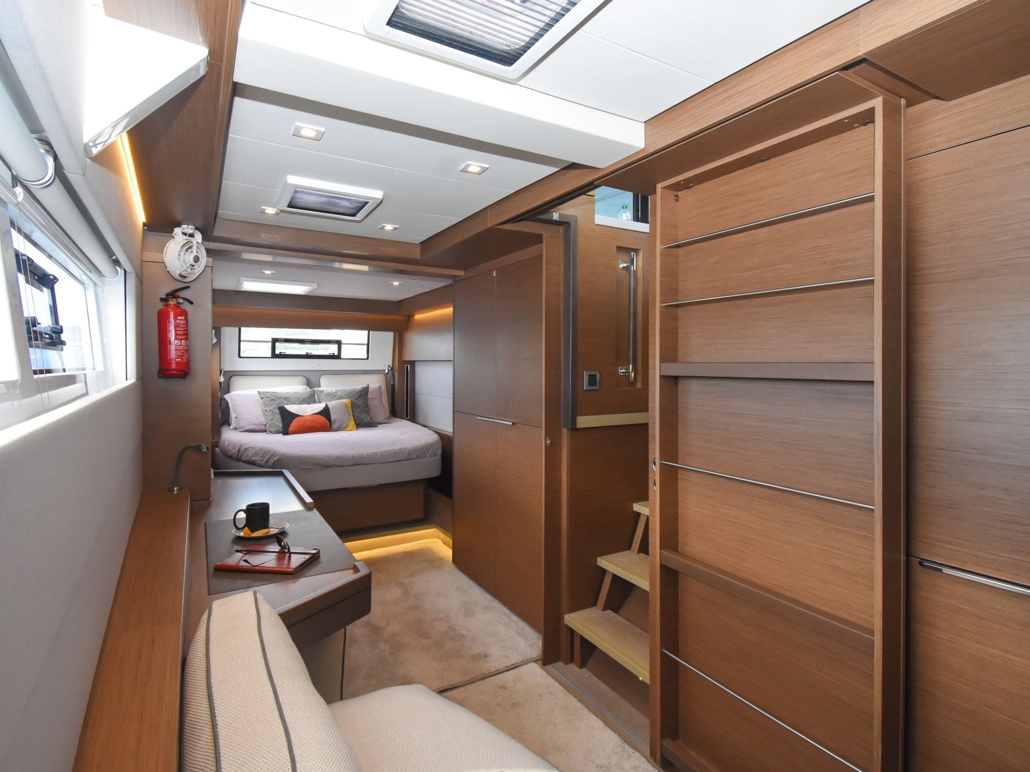 a bedroom with a bed and a mirror