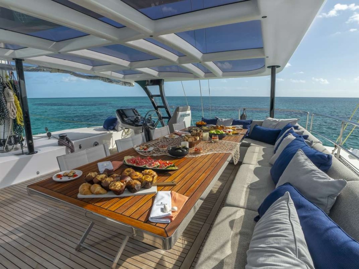 a boat that is sitting on a dock next to a body of water