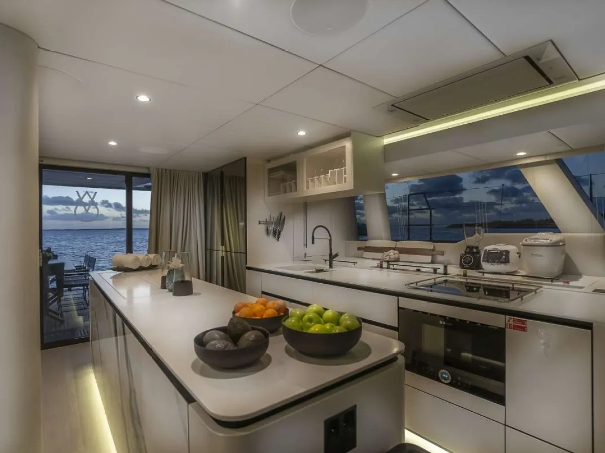 a stove top oven sitting inside of a kitchen