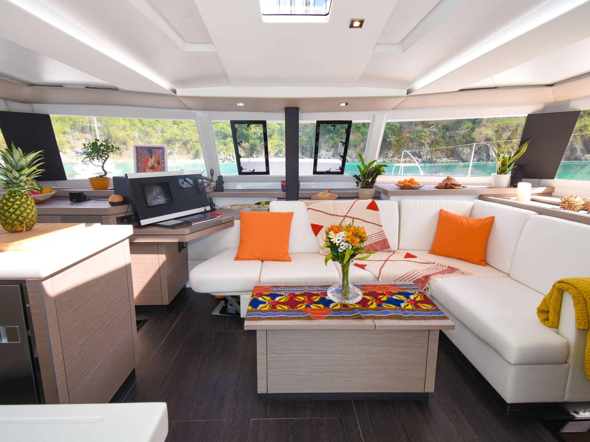 a living room filled with furniture and a large window