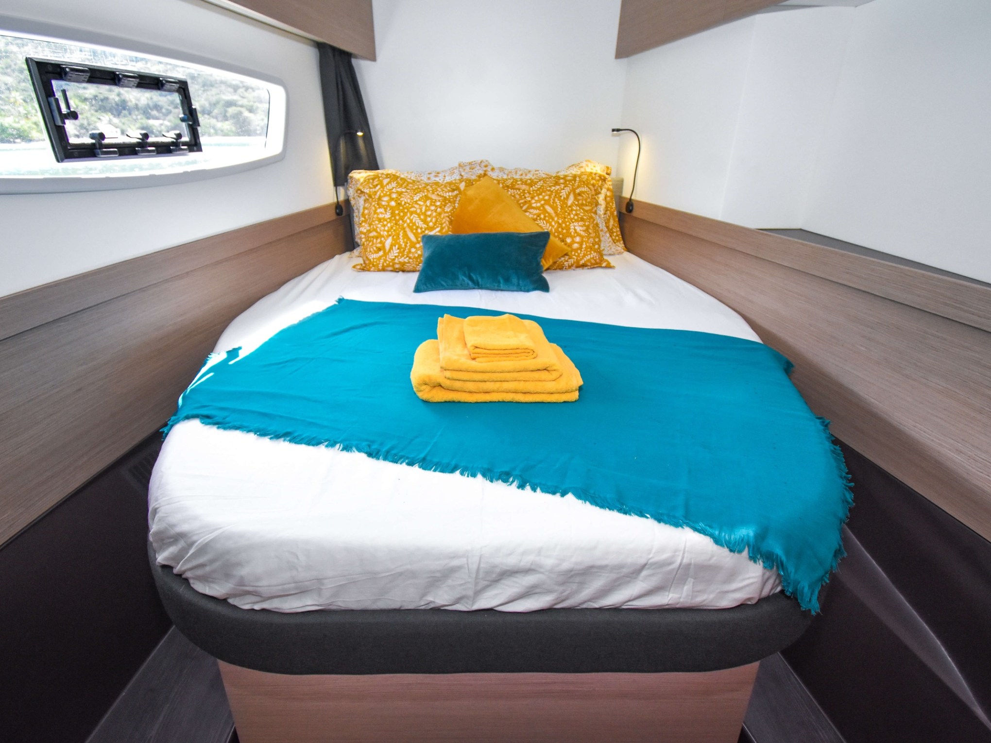 a bed with a blue blanket