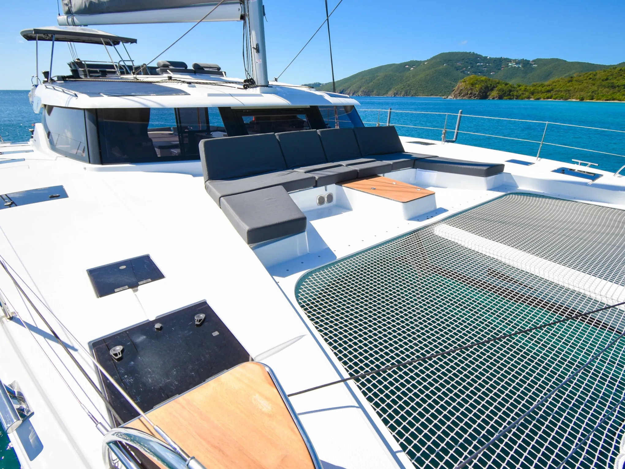 a boat is docked next to a body of water