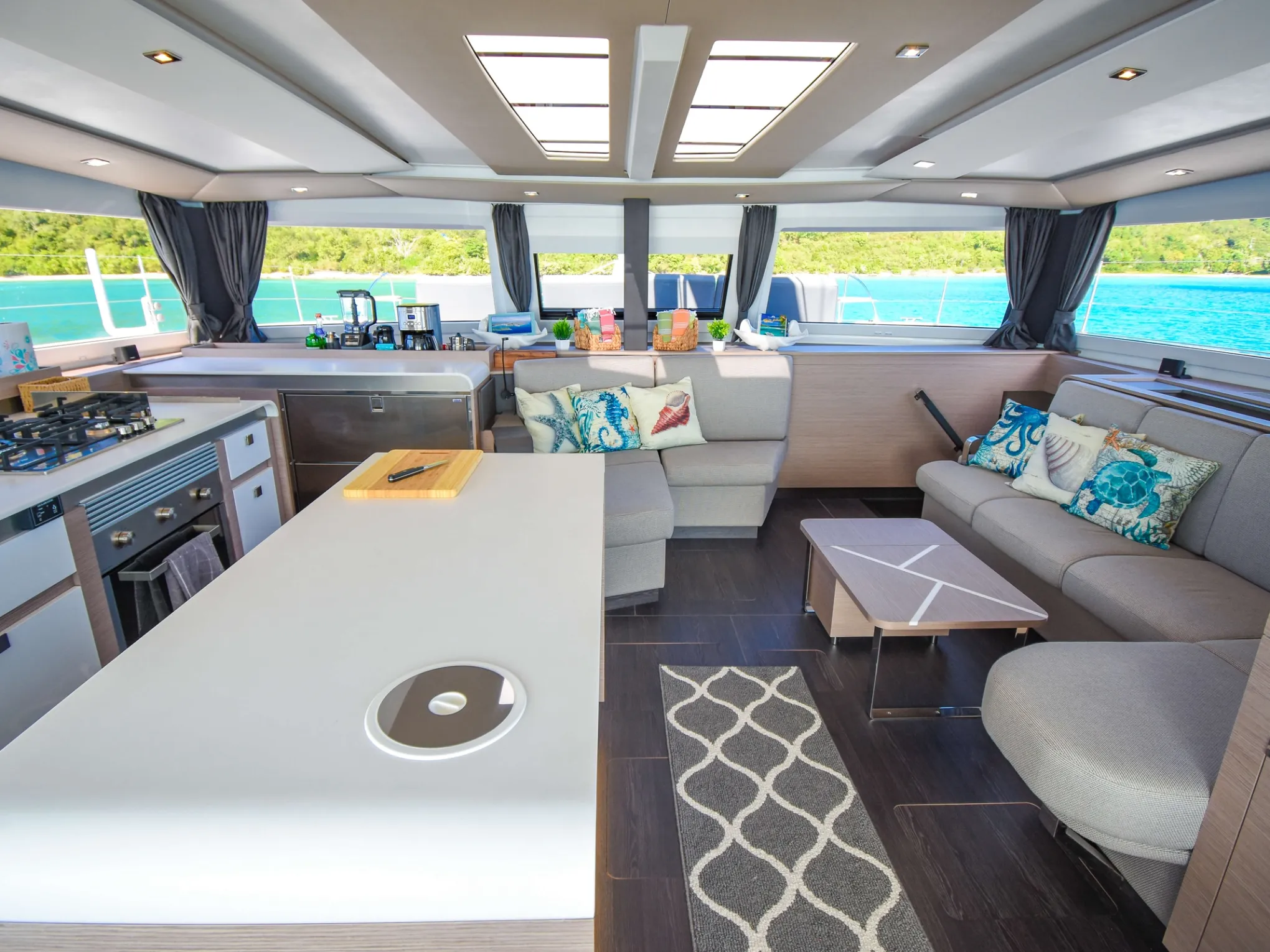 a room filled with furniture and a large window