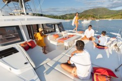 a group of people on a boat in the water