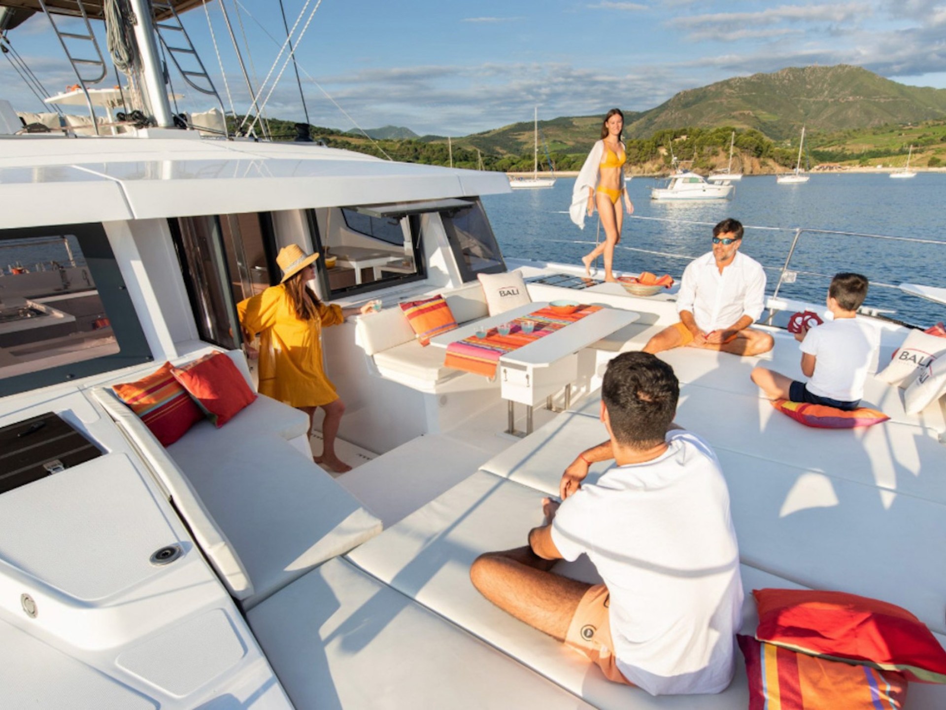 a group of people on a boat in the water