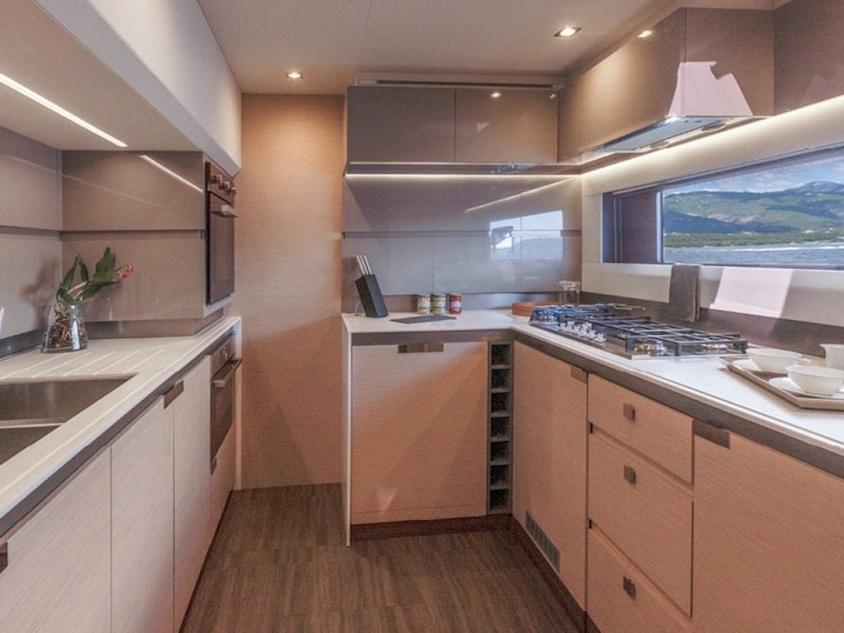 a kitchen with a sink and a window