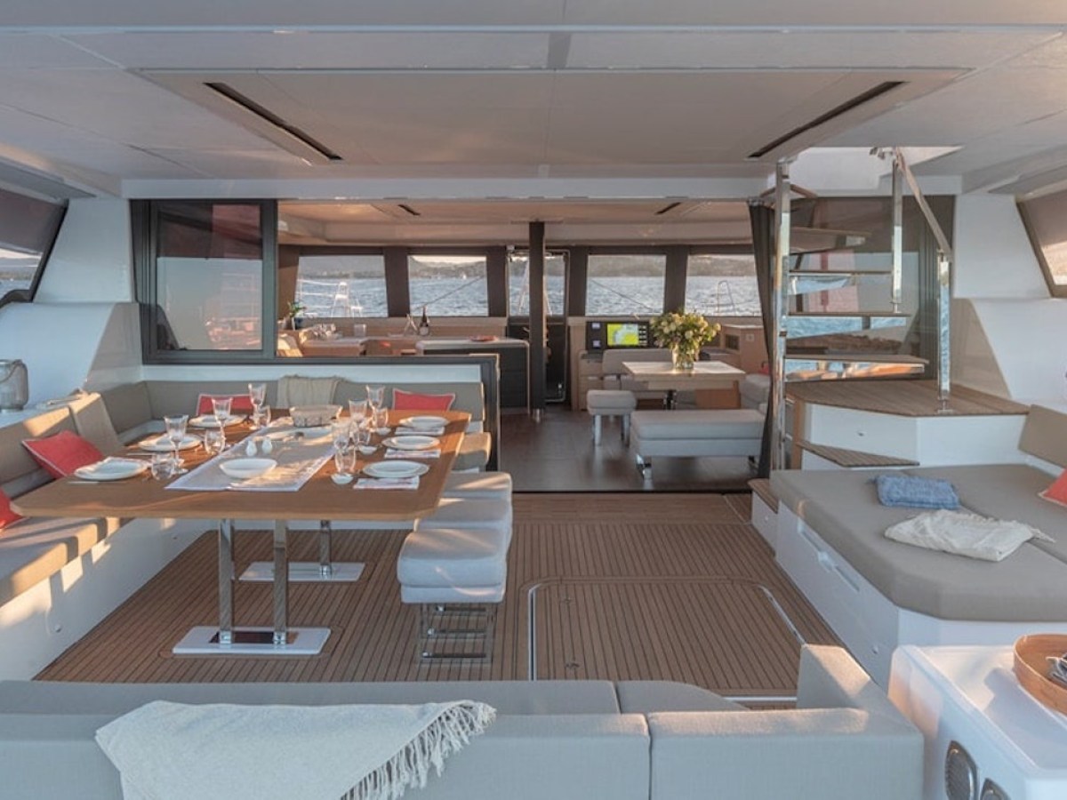 a room filled with furniture and a large window