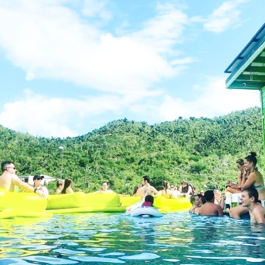 a group of people swimming in the water