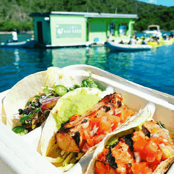 a plate of food with a glass of water