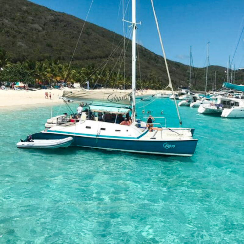 a small boat in a large body of water