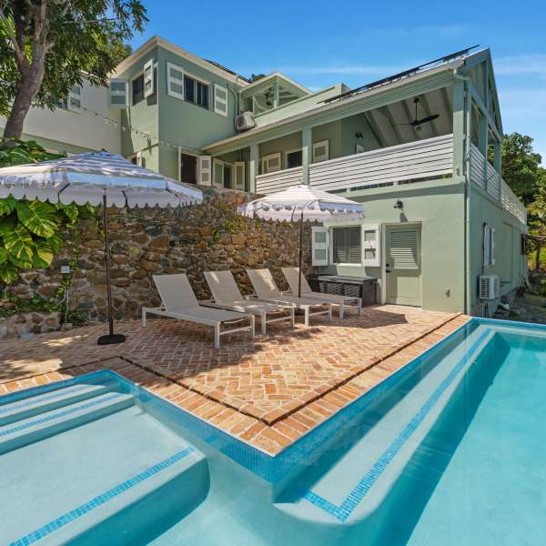 a pool next to a building