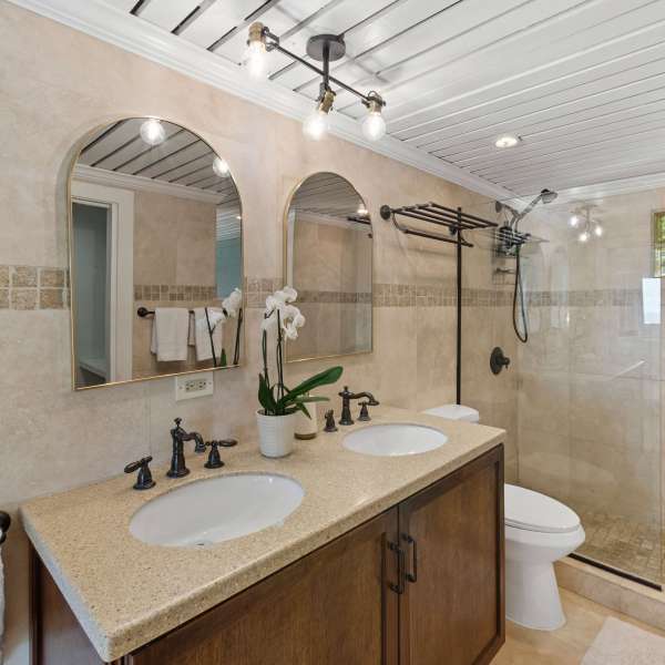 a room with a sink and a mirror