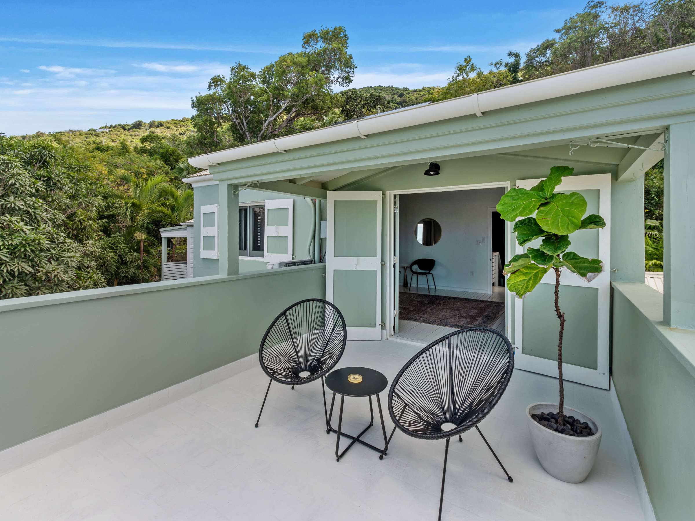 a house with trees in the background