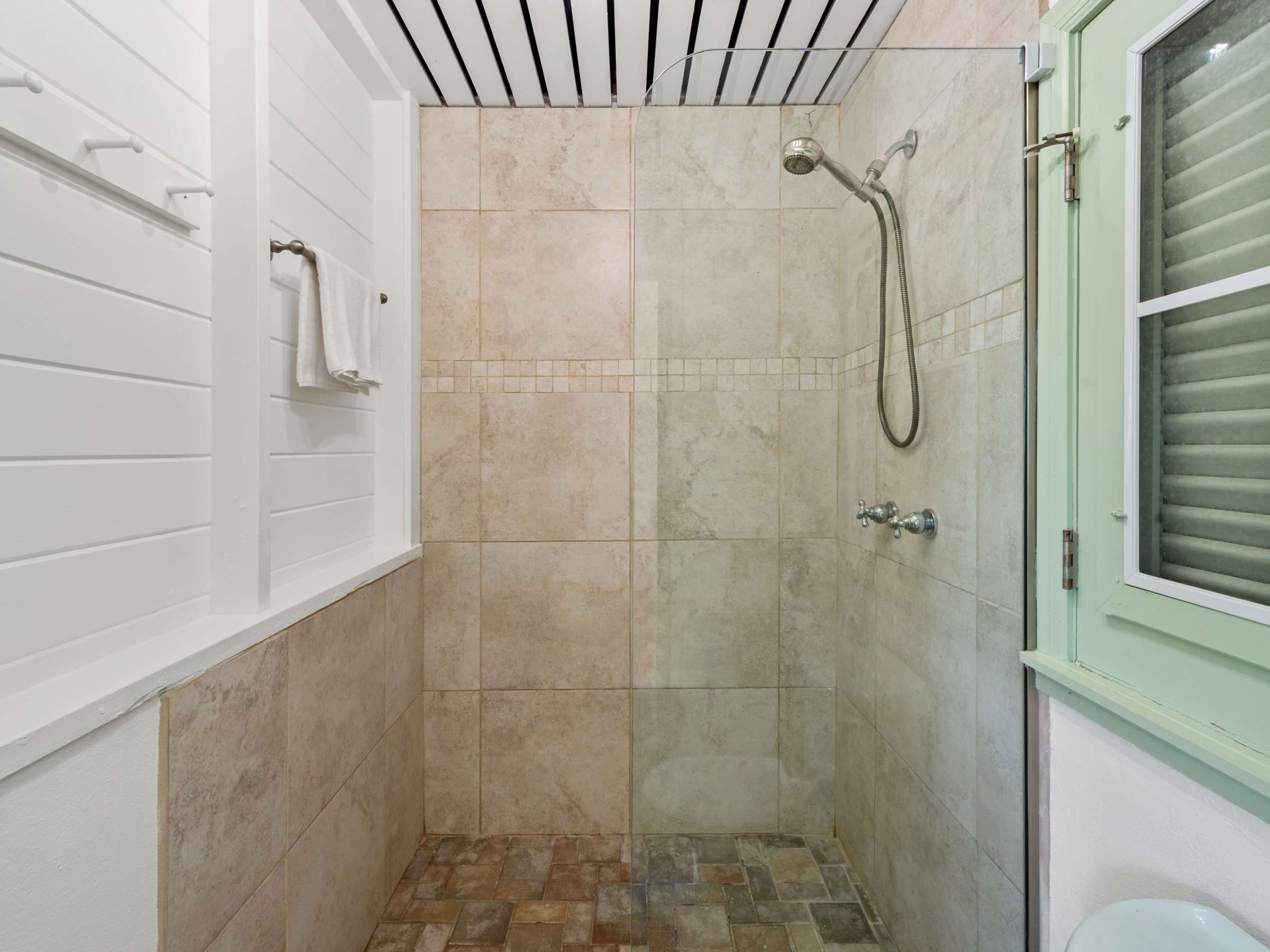 a close up of a shower in a room
